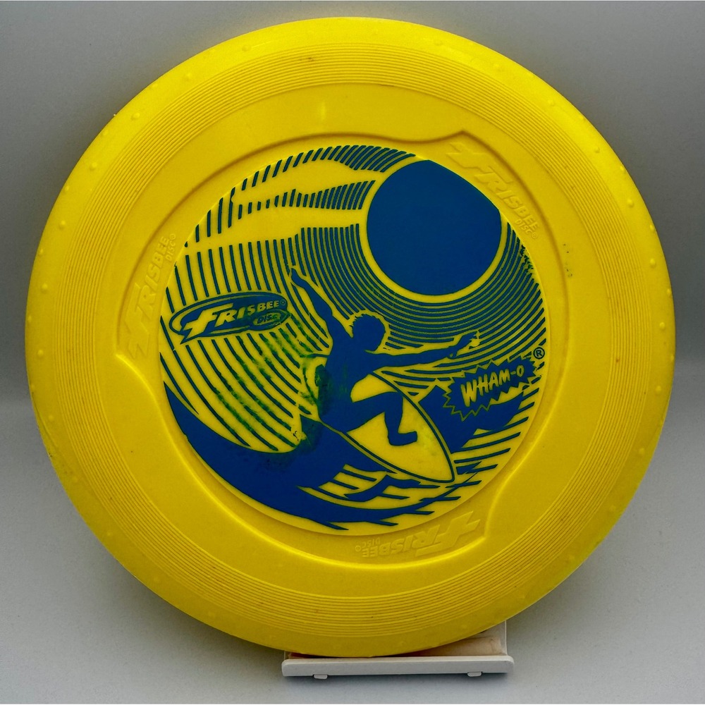 Vintage 2012 Wham-O Frisbee Pro-Classic Disc – Yellow/Blue Surfer Wave Graphic